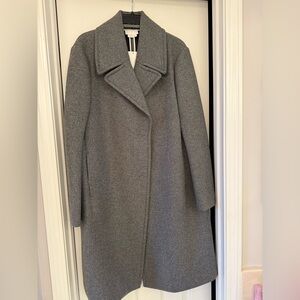 Gorgeous DKNY coat size large. 
Never been worn.